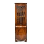 Modern reproduction glazed corner cabinet, 51cm wide x 38cm deep x 180cm high Condition: Key