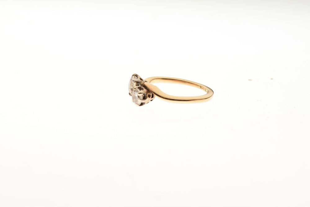 Yellow metal and two stone diamond ring of crossover design, shank stamped 18ct, the stones - Image 2 of 5