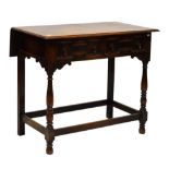 Early 20th Century oak two-drawer side table in late 17th Century style, the moulded top