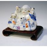 Mid 20th Century Chinese hotei figure, wooden stand Condition: Loss of decoration present with