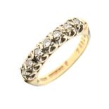 9ct gold dress ring set seven white stones (test as sapphires), size K, 3g gross approx