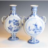 Pair of Delft Pilgrim bottle vases typically decorated, 27cm high Condition: Hairline crack and