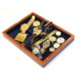 Wooden box containing a collection of vintage wristwatch heads including Tissot, Ingersoll,