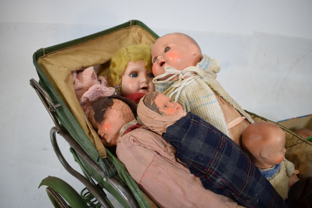 Vintage child's pram, in green, together with assorted group of bisque and other headed dolls - Image 8 of 9