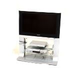 Panasonic Viera TX-32LXD500 television with integral stand, two glass shelves, and two remote
