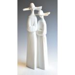 Lladro porcelain figure group of two nuns, 34cm high Condition: We endeavour to mention any post-