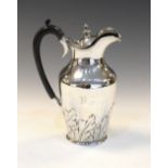 Victorian silver jug with embossed floral decoration and hinged cover, London 1891, 18.5cm tall,