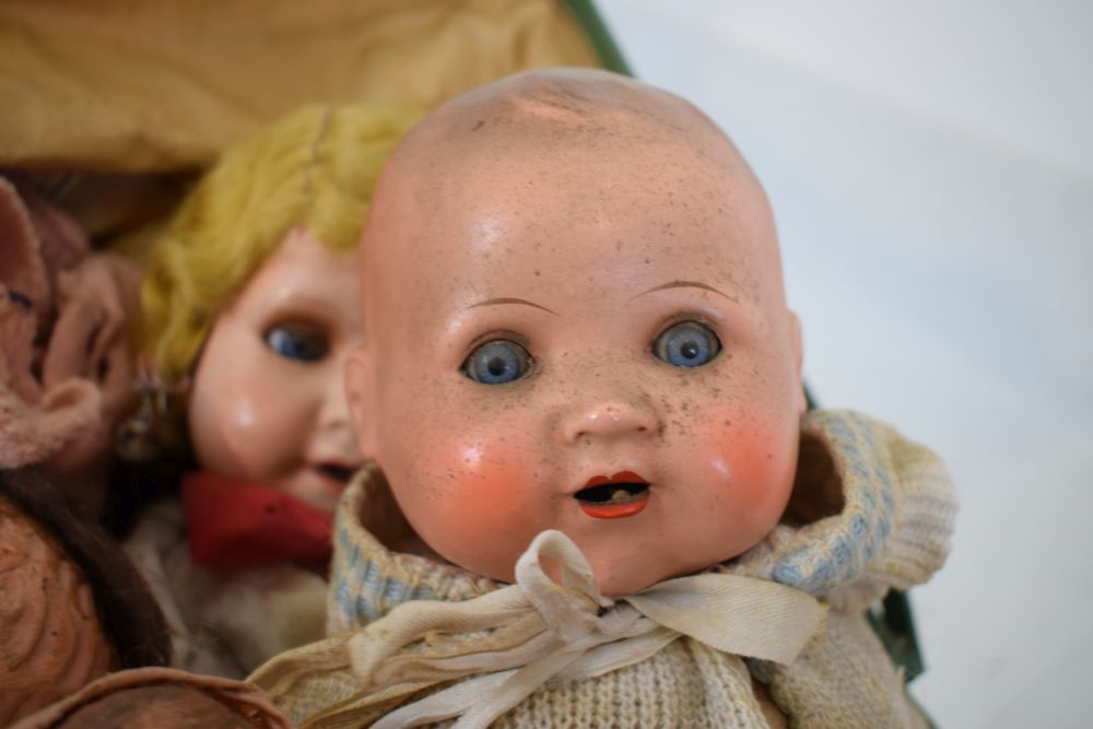 Vintage child's pram, in green, together with assorted group of bisque and other headed dolls - Image 9 of 9