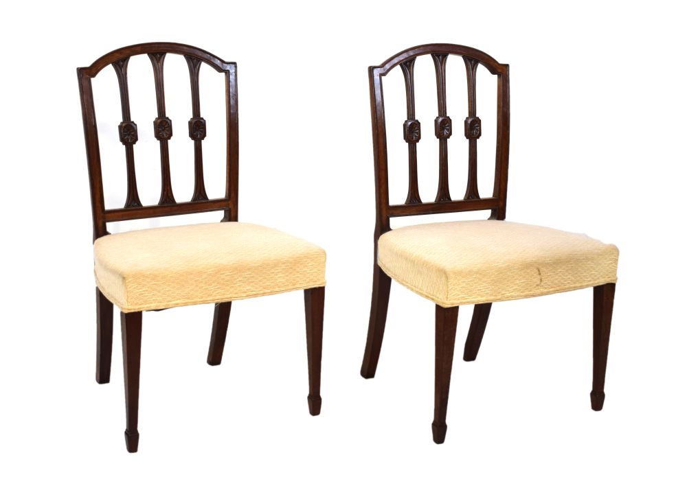 Pair of Sheraton style dining chairs with over stuffed seats Condition: Fading and stains to tops of