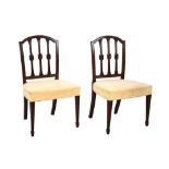 Pair of Sheraton style dining chairs with over stuffed seats Condition: Fading and stains to tops of