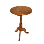Early 19th Century oak wine table, 42cm diameter x 62cm high Condition: Water staining to top,