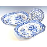 Two 19th Century flow blue graduated meat plates, and a pearl ware Willow pattern standish