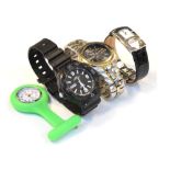 Three assorted wristwatches comprising Casio day/date, 100m water resist with quartz movement, black