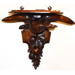 Late 19th/early 20th Century carved oak wall bracket, 38cm high Condition: Tips of wings of eagle