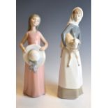Two Lladro figures, 28cm high and smaller Condition: We endeavour to mention any post-production