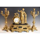 Early 20th Century French gilt spelter and black slate mantel clock with Roman dial, the case with