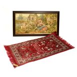 Small machine-made silk rug of 'Hunting' design, 46cm x 97cm, together with a machine-made framed