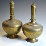 Pair of Indian brass covered vases, 29cm high (tallest) Condition: Knop of one cover missing,