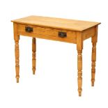 Late Victorian pine side table fitted one long drawer, 86cm wide x 69cm high Condition: Panels are