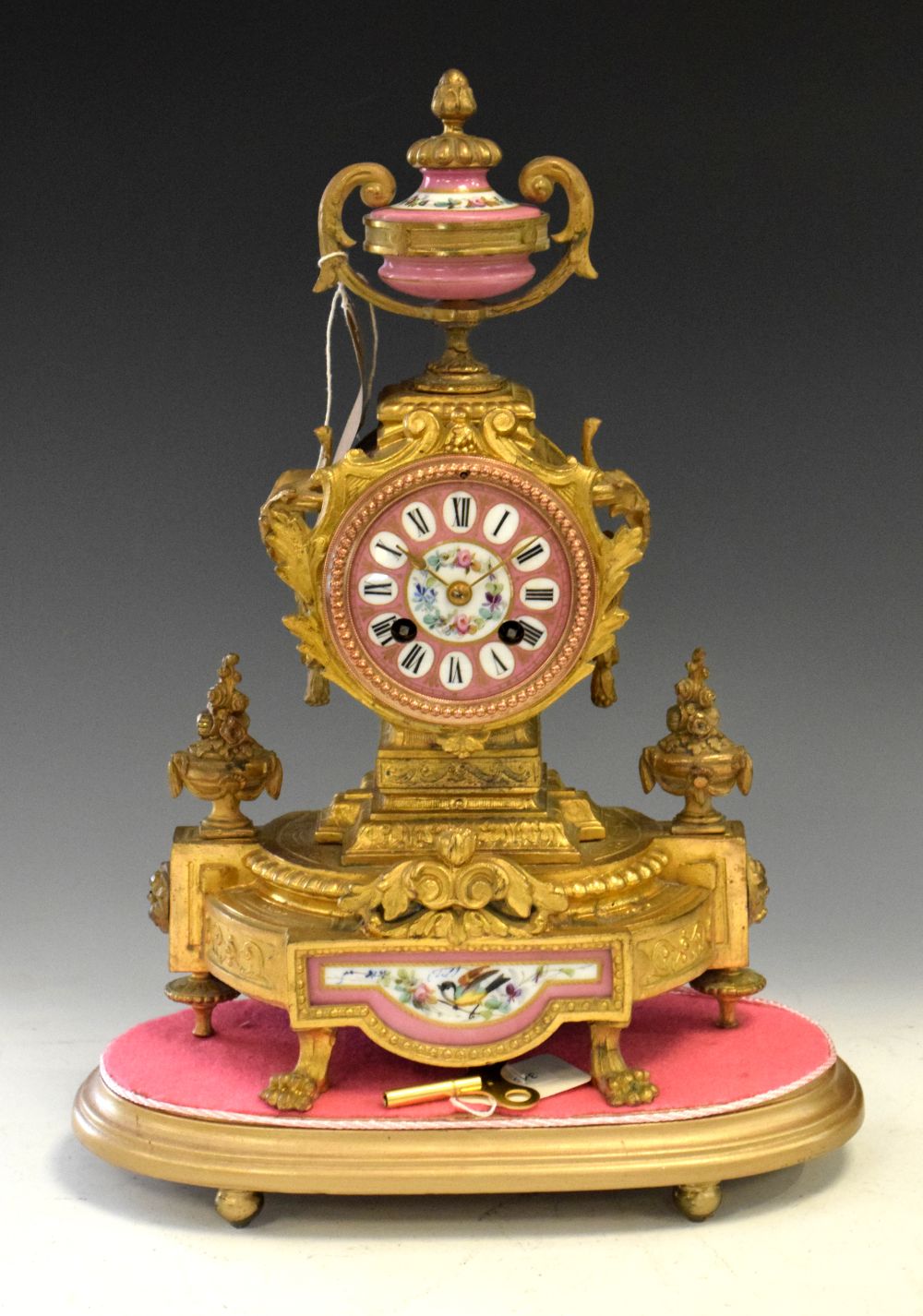 19th Century French porcelain mounted gilt metal mantel clock, 36cm high Condition: Sold as seen,