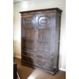 Early 20th Century oak wardrobe in late 17th Century geometric style, enclosing hanging space, 146cm