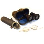 Pair of cased opera glasses, together with cased spectacles Condition: Heavy wear both to the case