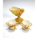 Royal Worcester small vase modelled as an upright nautilus shell, together with two miniature loving