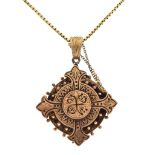 Victorian Gothic revival pendant of quatrefoil design, the rear with engraved dedication dated 1871,