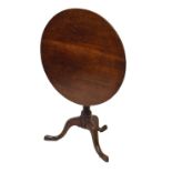 George III oak snap-top tripod occasional table with caster-turned stem, 81cm diameter Condition: