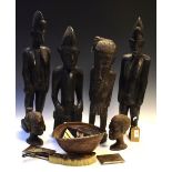 Ethnographica - Selection of carved wooden African carvings, together with two Indian cigarette