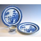 Two pearlware plates decorated in underglaze blue in the Willow pattern, early 19th Century and a