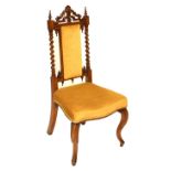 Mid Victorian walnut framed upholstered side chair Condition: Left finial reduced, scratches to