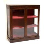 19th Century mahogany display cabinet, twin glazed doors and side panels, the interior velvet-