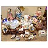 Collection of Chinese ceramic figures, 20th Century, to include figure of Buddha, and erotic tea pot