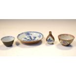 Four items of Chinese café au lait ware, to include tea bowl reserved with Famille Rose panels,