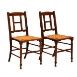 Pair of early 20th Century mahogany bar back chairs with string seats Condition: Seat string is in