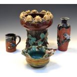 Group of Japanese Sumida Gawa relief pottery, comprising a pedestal vase, the neck with applied frog