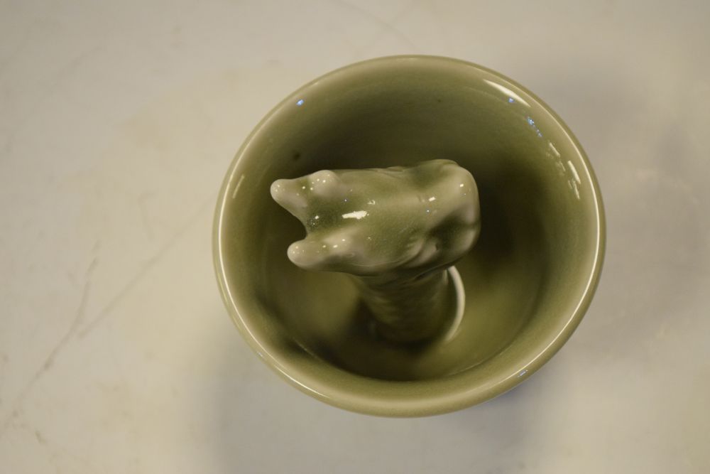 19th Century Chinese porcelain 'justice' cup, together with a 20th Century celadon example, 8cm high - Image 9 of 11
