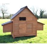 Wooden chicken house/hen coop, 113cm high x 163cm wide Condition: Generally in good useable