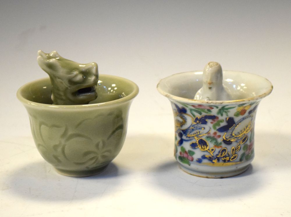 19th Century Chinese porcelain 'justice' cup, together with a 20th Century celadon example, 8cm high