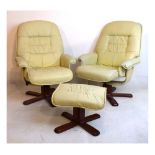 Pair of 'Stressless' style armchairs and footstool in cream finish Condition: Upholstery is a little