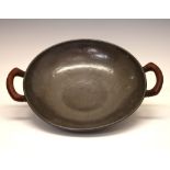 Tudric pewter two-handled bowl with Bakelite handles, stamped 01558 to base, 26.5cm diameter (see