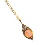 Yellow metal shell cameo and seed pearl pendant, together with a double curb link necklace stamped