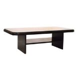 Composite 'granite' coffee table, 36cm high x 109cm long Condition: Scratches present with some smal