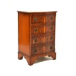 Reproduction serpentine yew wood front four-drawer chest of drawers, 76cm high x 50cm wide x 39cm