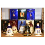 Collection of eight Bell's Aged 8 Years Extra Special Old Scotch Whisky ceramic bell shaped