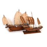 Two Japanese Junks, both with sails Condition: Contents unchecked, damage to both of the boats,
