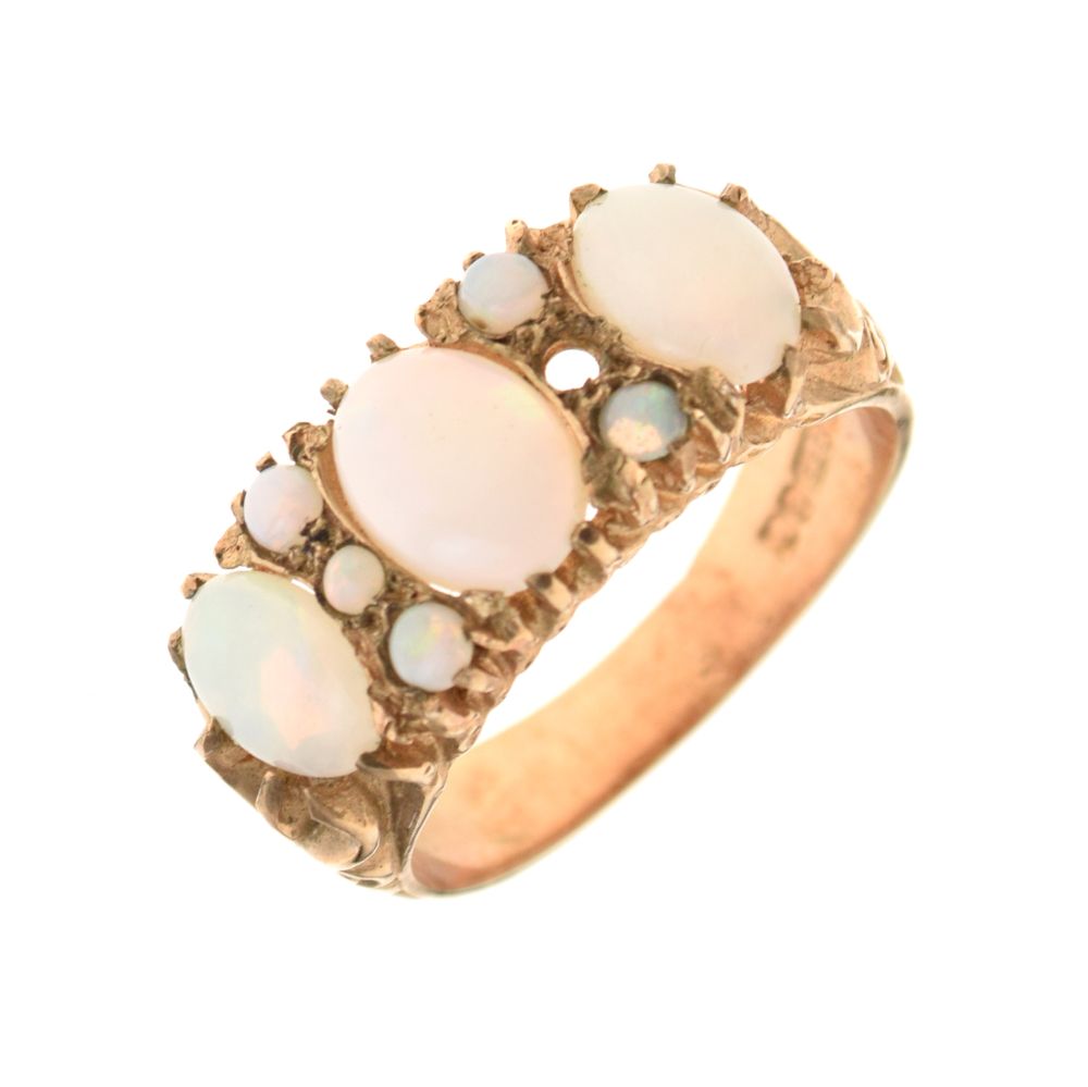9ct gold and opal dress ring, size Q, 5.1g gross approx Condition: One small opal missing, stones