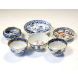 Quantity of under glazed blue and white tableware including tea cups and salt Condition: The salt