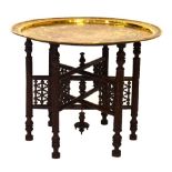 Benares brass tray top table, 69cm diameter x 55cm high Condition: Appears sound no dents or